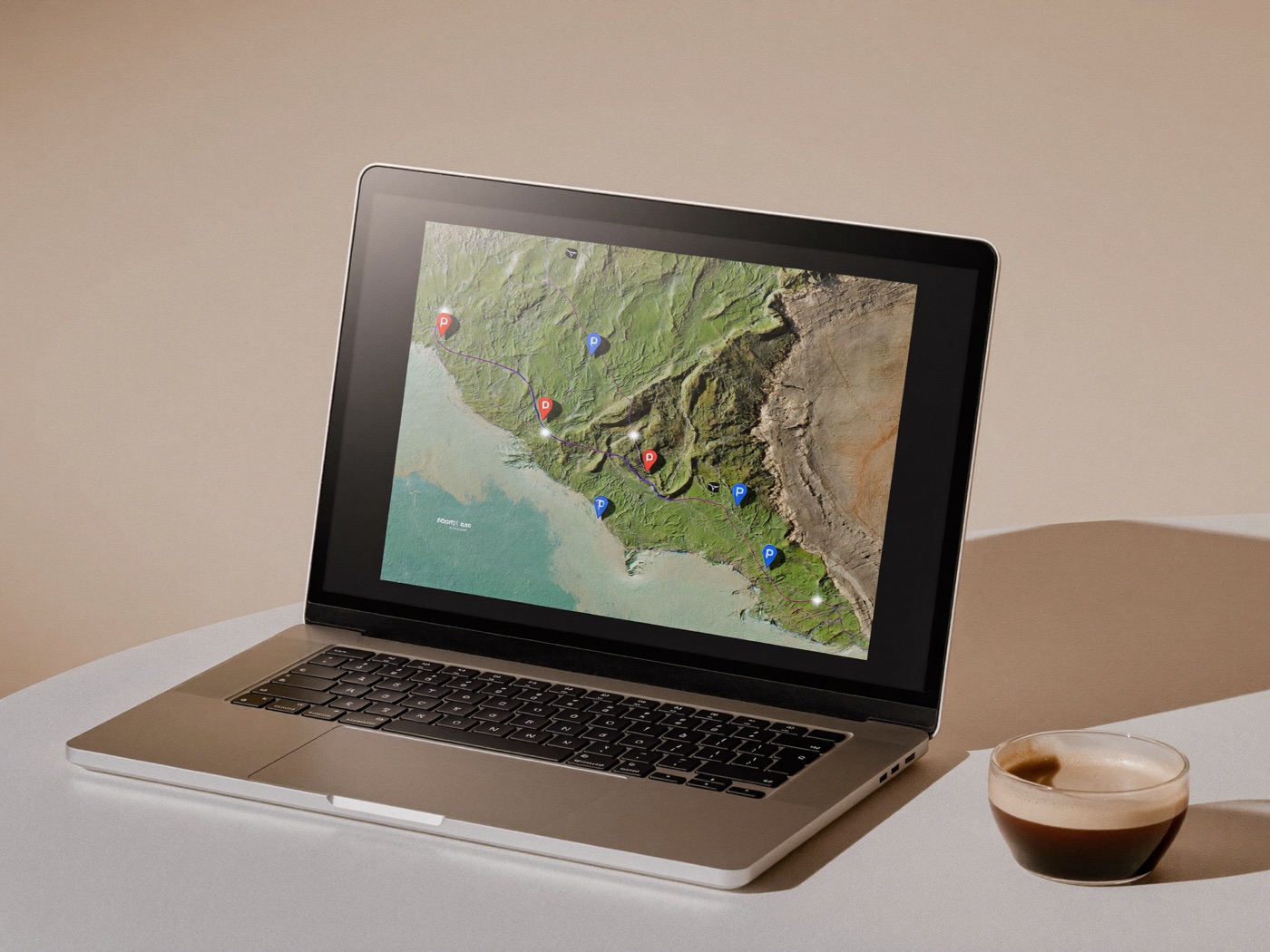 A laptop showing location pages mapped across the Northern Beaches